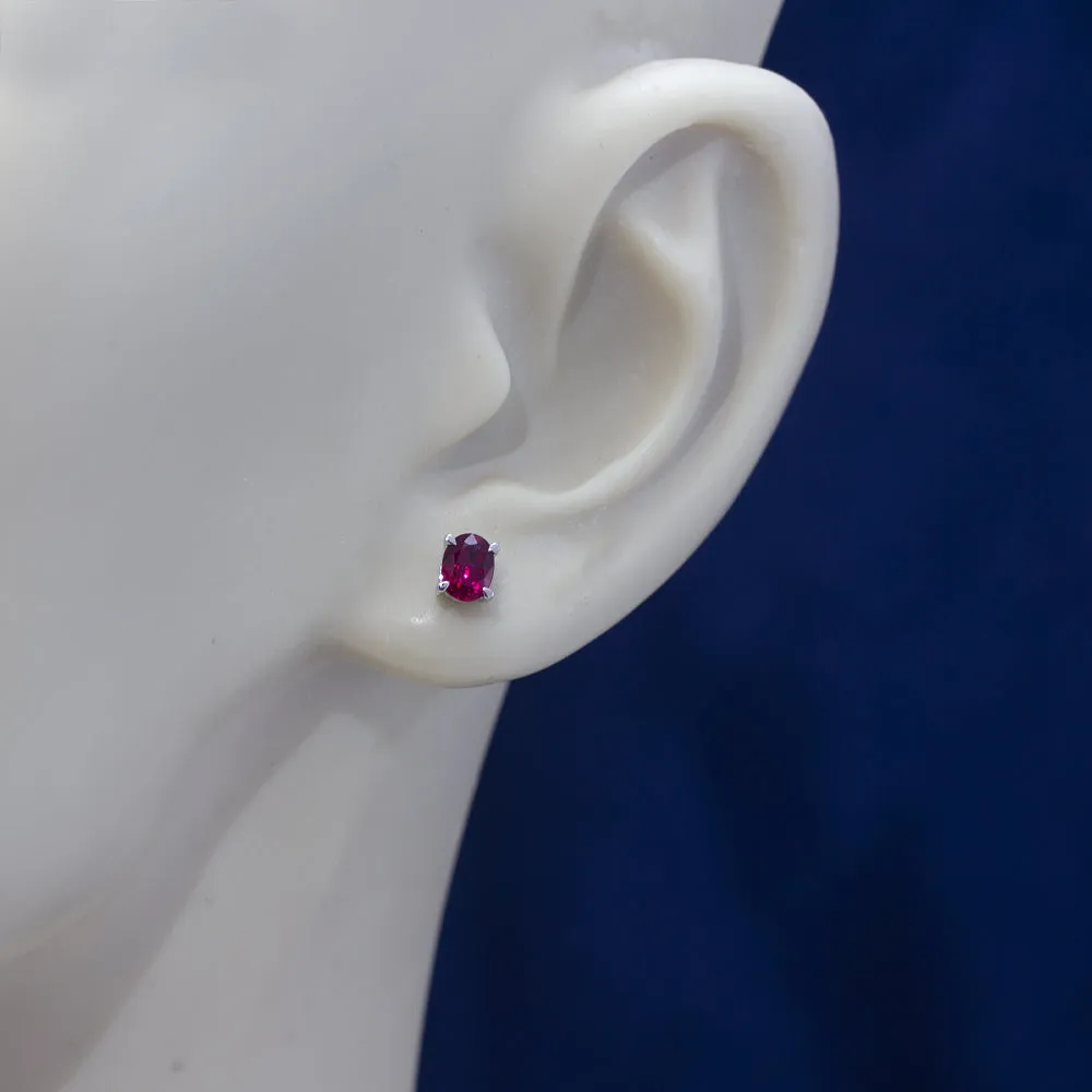 18ct White Gold Oval Ruby Stud Earrings - 5mm