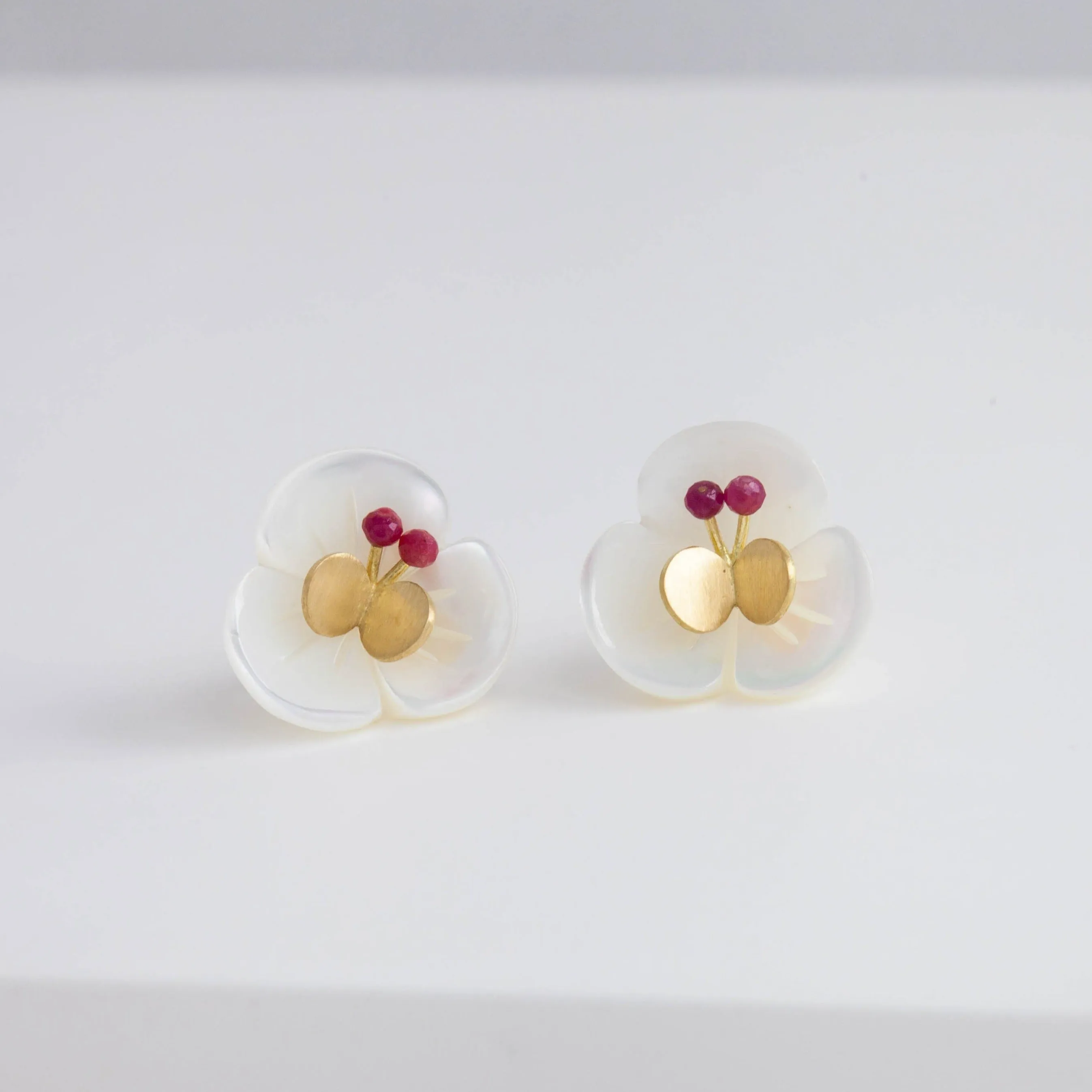 Plum flower ruby butterfly earrings