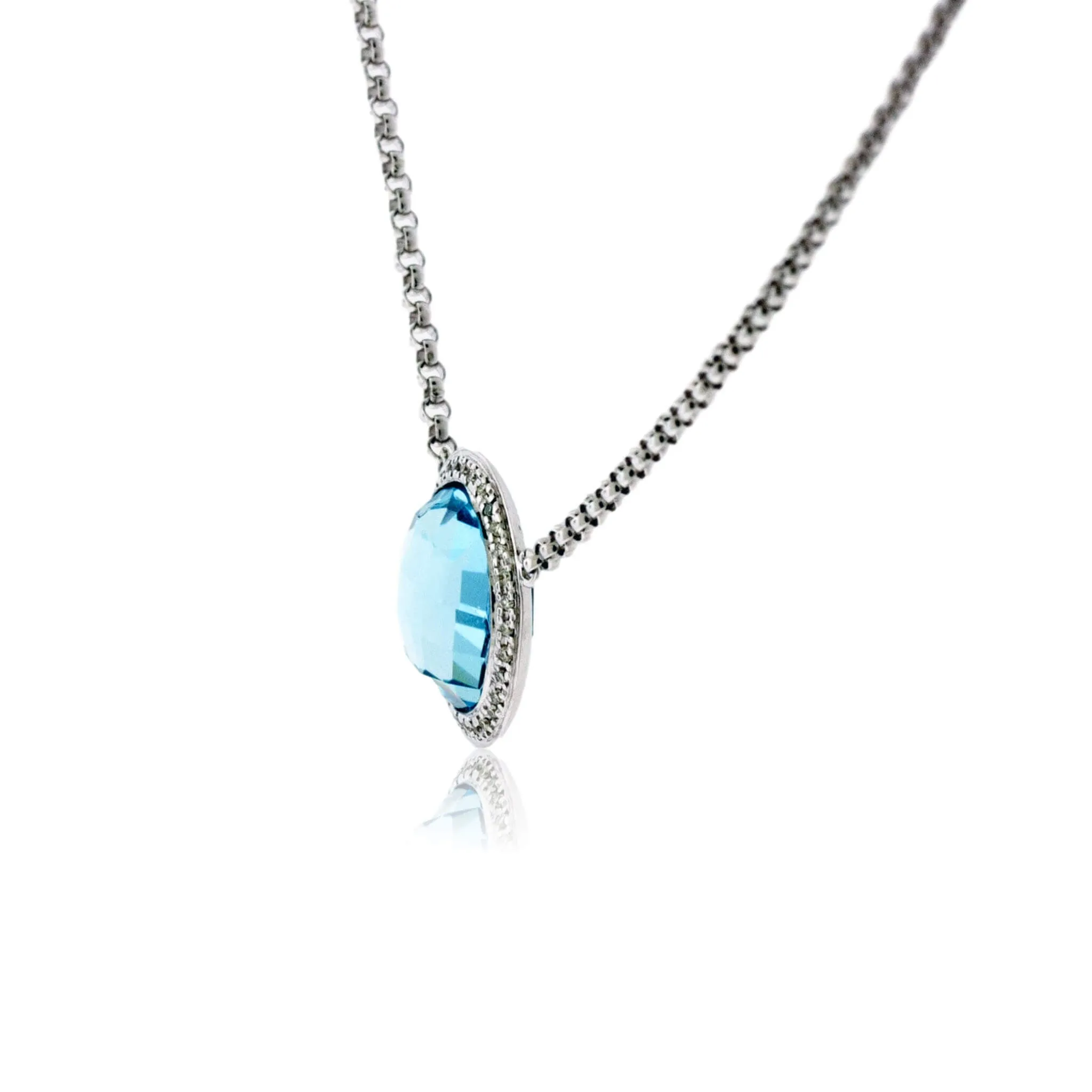 Round Blue Topaz & Diamond Halo Pendant